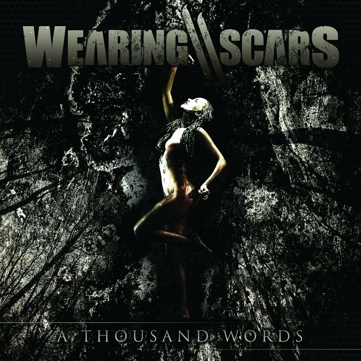 Wearing Scars - A Thousand Words in der Gruppe CD bei Bengans Skivbutik AB (1387214)