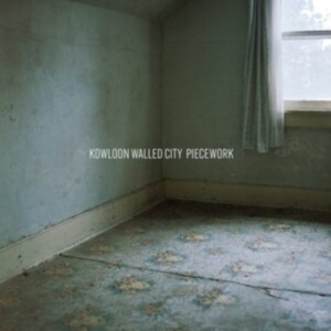 Kowloon Walled City - Piecework (Milky White Vinyl) in der Gruppe Övrigt /  bei Bengans Skivbutik AB (4208409)