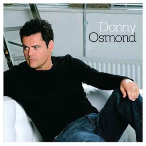 Donny Osmond - On Couch Magnet in der Gruppe MERCHANDISE / Merch / Pop-Rock bei Bengans Skivbutik AB (5536634)