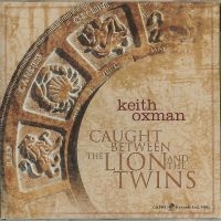 Keith Oxman - Caught Between The Lion And The Twi in der Gruppe CD bei Bengans Skivbutik AB (5558977)