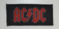 Ac/Dc - Patch Red Logo (4,4 X 9,7 Cm) in der Gruppe MERCHANDISE / Stoffaufnäher / Heavy Metal bei Bengans Skivbutik AB (5577290)