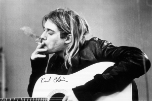 Kurt Cobain - Smoking Acoustic Guitar 91,5 X 61 Cm in der Gruppe Merchandise bei Bengans Skivbutik AB (5634282)
